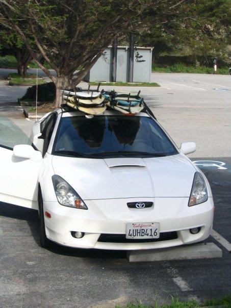 lots-of-surfboards-on-a-small-car.jpg