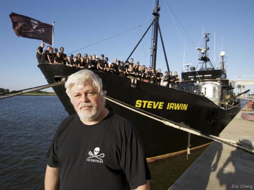 paul founder and crew in front of one of sea shepherd vessels.jpg